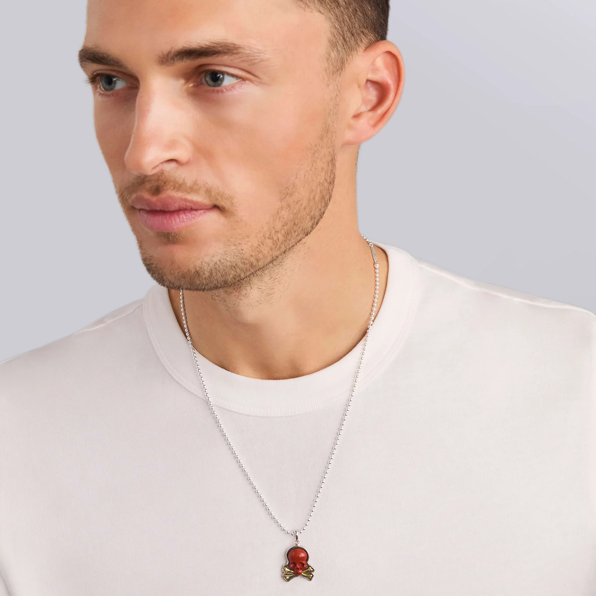 Anthem Two-Tone Red Jasper Skull and Bones Amulet - Image 2
