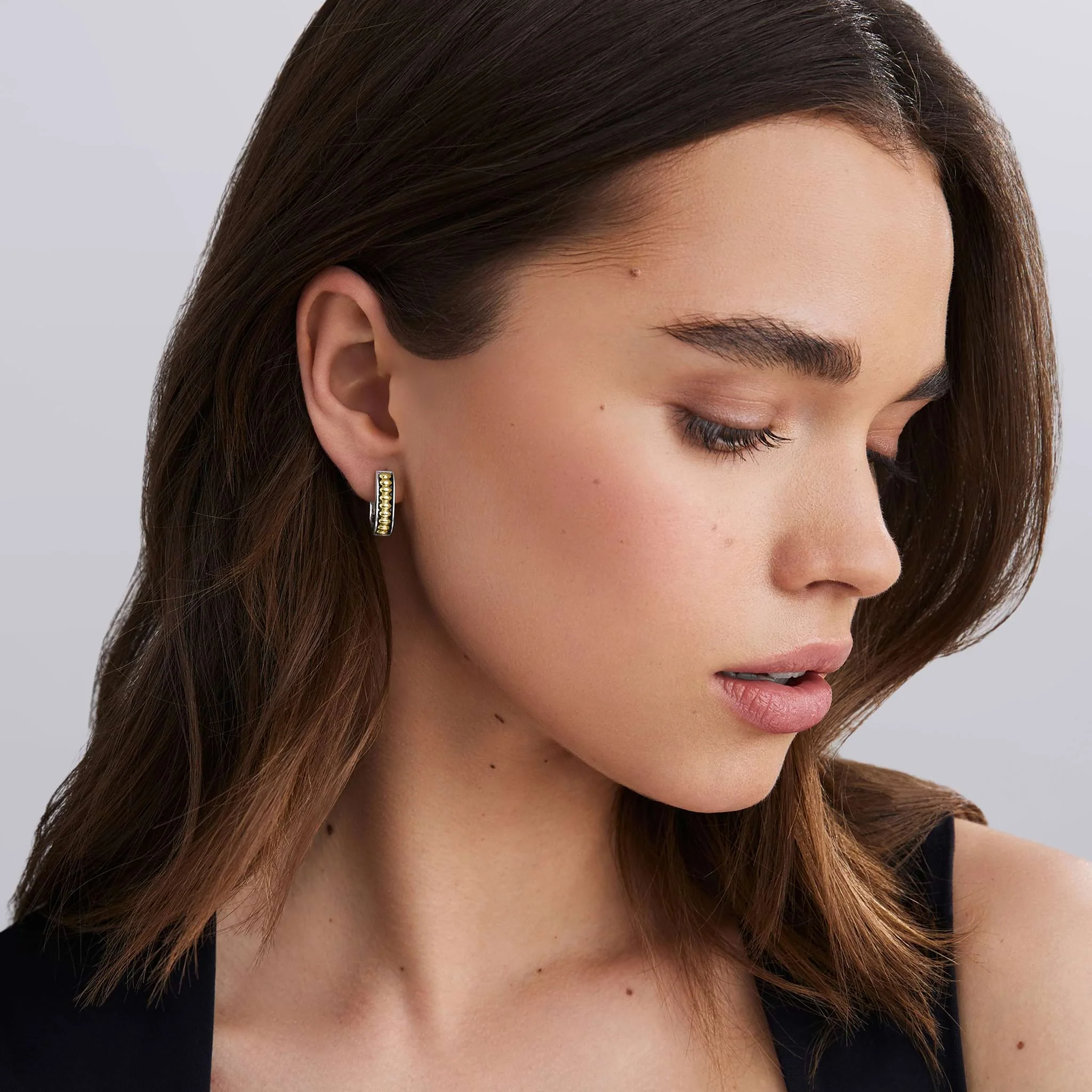 Signature Caviar Two-Tone Linear Huggie Earrings - Image 2