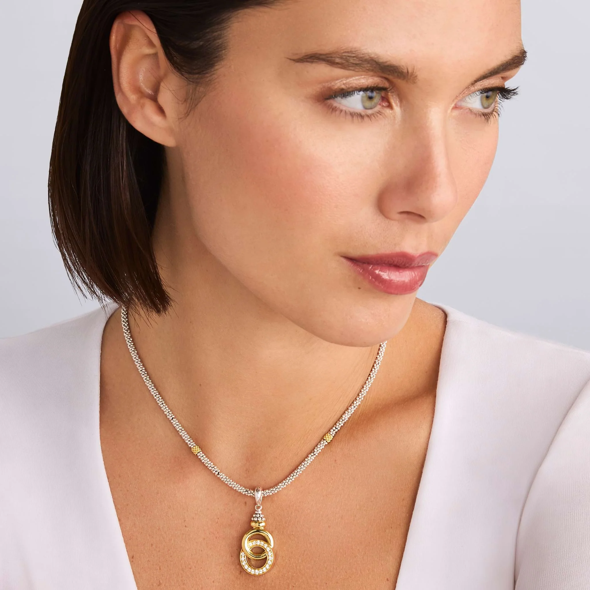 Signature Caviar Two-Tone Interlocking Diamond Pendant Necklace - Image 2